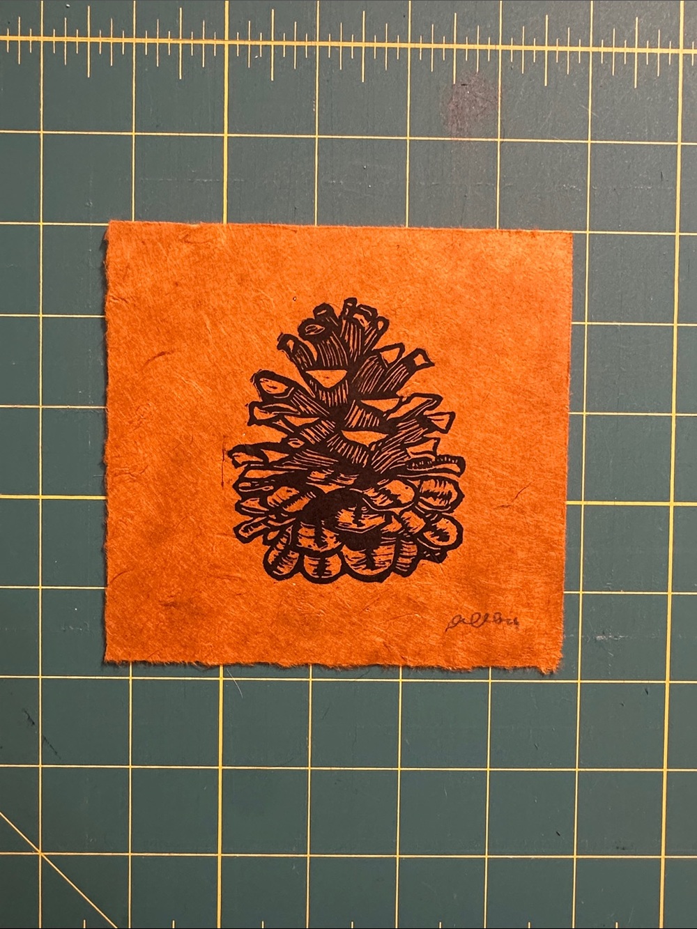 5x5" Linocut Pinecone Illustration on Rust Paper